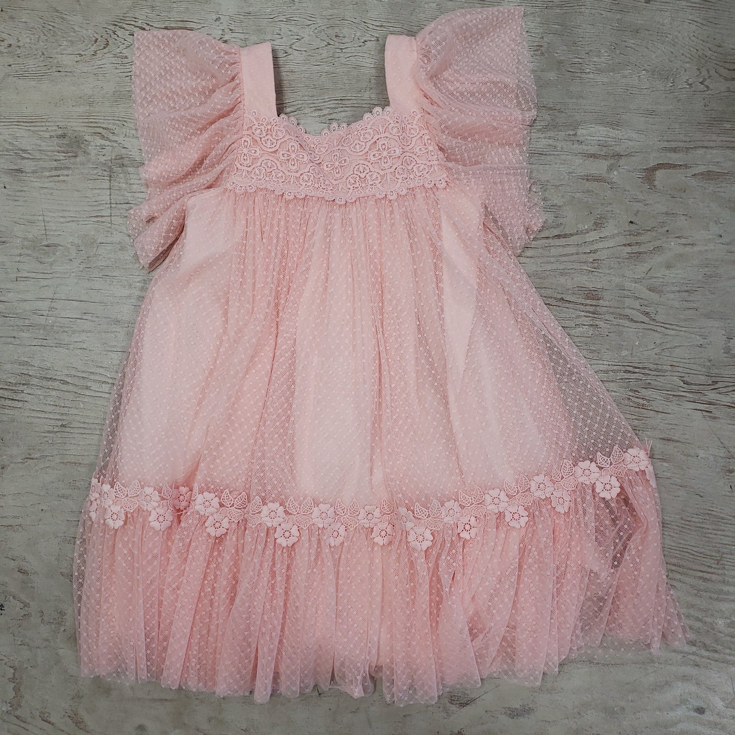 Peach lace dress by Abel & Lula